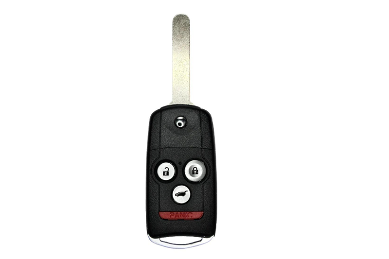 A car key with the remote on it.