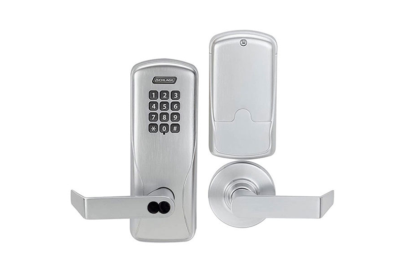 A silver door lock with a key pad and electronic keypad.