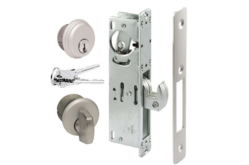 A set of locks and door hardware for a home.