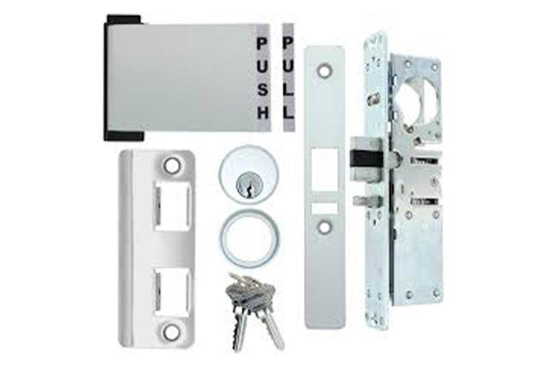 A set of locks and keys for a door.