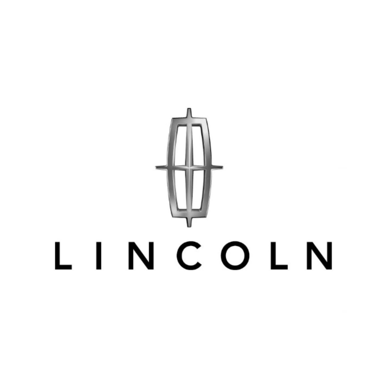 A black and white photo of the lincoln logo.