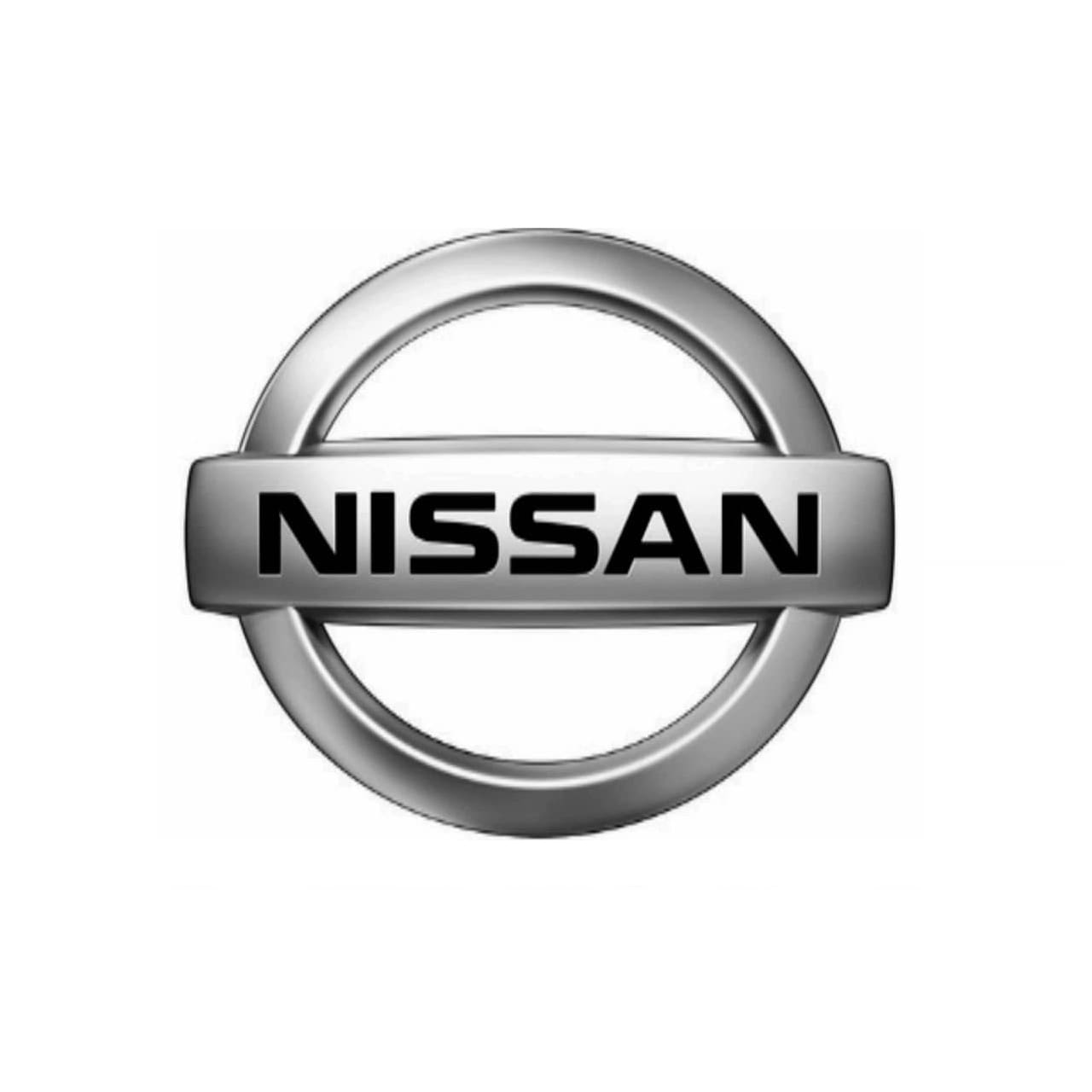 A silver nissan logo on top of a white background.