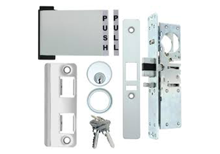 A set of locks and keys for a door.